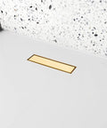24 Inch Linear Shower Drain With Removable Square Hole Panel In Brushed 304 Stainless Steel installed in shower floor