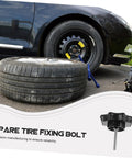 Car with spare tire partially installed using Spare Tire Bolt and Clamp Kit for Easy Mounting, visible along with the tire and tools.