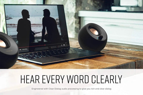 Minimalist USB-C Desktop Speakers With Bluetooth 5.0, 8W RMS, 2.25-Inch Drivers next to laptop on wooden desk