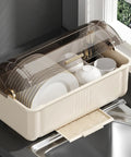 Sleek White Plate Drying Rack And Smart Kitchen Organizer Built With Hella Sturdy Pp Pet Material Offering Massive Counter Storage that holds dishes and utensils.