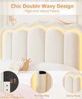 Full Size Beige Velvet Platform Bed Frame With Soft Led Lighting And Dual Gliding Storage Drawers Plus Adjustable Wavy Headboard.