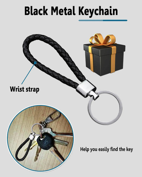 Black metal keychain with braided wrist strap, shown alongside a ring of keys and a gift box illustration.