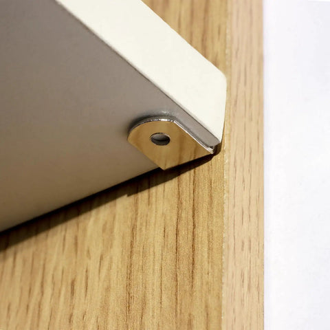 Solid As A Rock Metal Shelf Pegs 1 4 Inch L shaped support bracket installed on a wooden cabinet shelf.