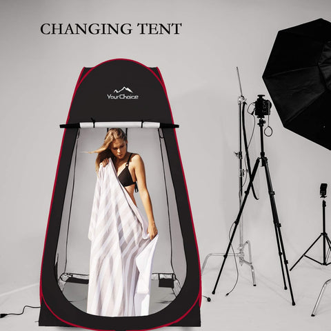 Instant Pop Up Privacy Tent 3.9x3.9x6.9 Ft Large Portable Changing Room with model inside, black with red accents, in studio.