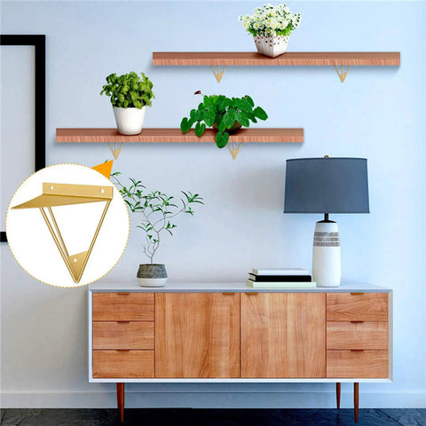 Legit Heavy Duty Wall Shelf Brackets Set Of Two supporting plants in white pots on wooden shelves with triangular connectors.