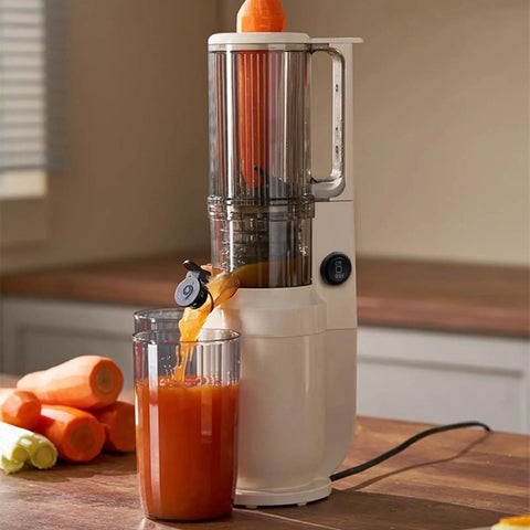 Aynefy 200W Cold Press Juicer With Wide Feed Chute For Whole Fruits extracting fresh juice into a glass.