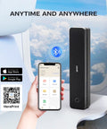 Game Changing Portable Bluetooth Printer With No Hassle Inkless Thermal Tech For Dang Quick US Letter Paper High Speed 300Dpi Imaging black printer next to smartphone in airplane setting.