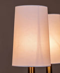 Close-up of white fabric shade on Matte Black Farmhouse Linear Island Chandelier With White Fabric Shade For Kitchen And Dining.