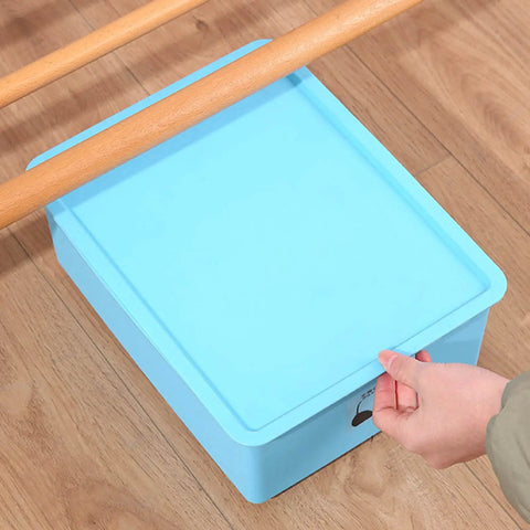 Stainless Steel Furniture Roller With Adhesive Sliders For Heavy Load Moving Washer Dryer Machine And Couch Glide Home Essentials on blue storage box.