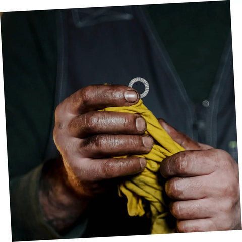 Premium 20 Piece Manganese Lock Washers With Double Wedge Tooth Design held by a worker, showcasing its anti-vibration features.