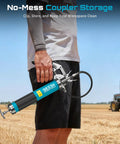 Beefy 8000 PSI Grease Gun Kit With Pistol Grip And 14oz Capacity, in use on a farm, showing quick release coupler and flexible hose.