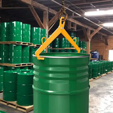 Heavy Duty 55 Gallon Vertical Drum Clamp Lifter With 1100 Pound Capacity For Steel Or Plastic Drums lifting a green drum in a warehouse.