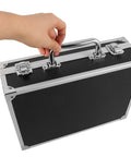 Hand holding the handle of a Lockable Aluminum Alloy Toolbox With Ergonomic Handle Rock Solid Portable Storage Case For Mechanics And Builders.