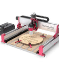 NBX-5040 CNC Router with 710W Beefy Trim Spindle, 7000-30000 RPM, engraving a wooden disk, ER-11 collet visible.
