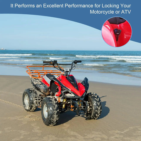 ATV with 2 Pin Universal Motorcycle Ignition Starter Switch For ATVs And Dirt Bikes on beach, focus on ignition detail