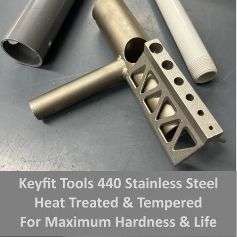 Pipe Drill Jig for Cylinders and Pipes Contractor Grade 440 Stainless Steel Heat Treated for Maximum Hardness and Life on workbench.