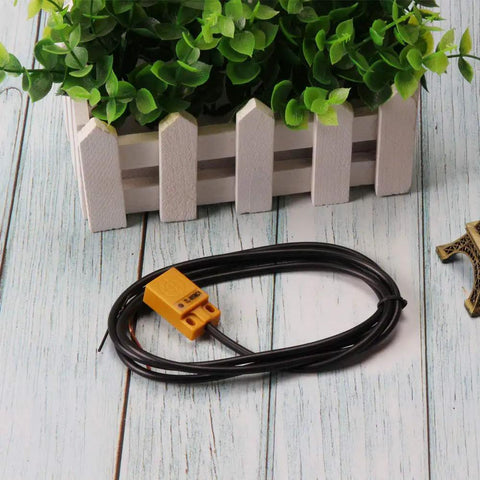 3 Pack TL W5MC1 5mm Inductive Proximity Sensor 3 Wire NPN DC 6-36V Detection Switch on wooden surface near plant
