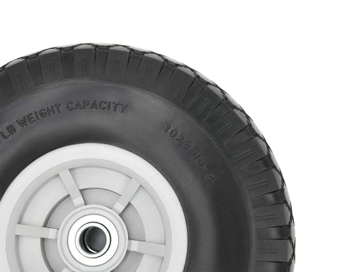 Close-up of a 10 Inch Flat Free Tire And Wheel Assembly For Dolly Hand Trucks And Carts, showing solid rubber and axle bore detail.