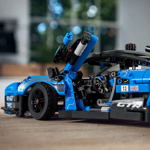 Close-up of LEGO Technic McLaren Senna GTR model with detailed dihedral doors "Build And Display A McLaren Senna GTR Toy Car Kit Ultra Detailed 1 To 14 Scale Model For Builders And Car Fans Realistic Racing Replica With Collectible Look Perfect Gift For McLaren Enthusiasts And Tech Junkies"