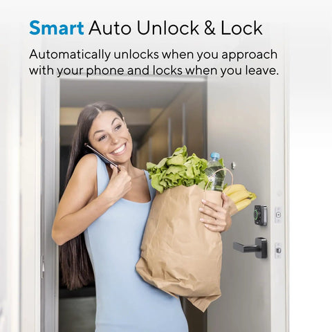 Woman entering home with groceries using WiFi Smart Lock With Handle And Fingerprint Keyless Entry, Auto Lock And Auto Unlock, App Remote Control, Front Door Deadbolt, ANSI Grade 1, No Hub Needed, Direct 2.4GHz Connection.
