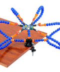 Six Flexible Arm Helping Hands Soldering Station With Silicon Clip Tips clamped to table demonstrating use for electronics projects.