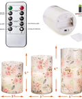 Pink Flameless Candles With Remote Timer, Flickering Glass Pillar Candles For Romantic Vibes, Battery LED Pillars With 2 4 6 8 Hour Timers, Rose Themed Decor shown with remote control and AA battery compartment