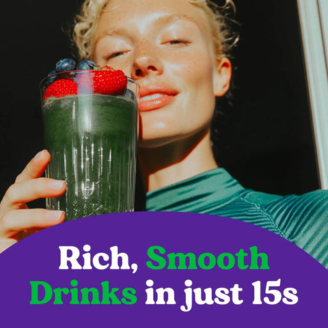 Person holding green smoothie in glass with berries, text reads 'Rich, Smooth Drinks in just 15s', showcasing beverage consistency.