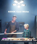 Ridiculously Bright LED Garage Light 400 Watt Equivalent 6500K Cool Daylight White lighting up workbench scene with father and child