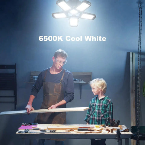 Ridiculously Bright LED Garage Light 400 Watt Equivalent 6500K Cool Daylight White lighting up workbench scene with father and child