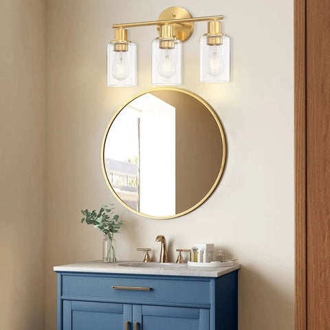 Three Light Matte Black Vanity Light With Clear Glass Shades for Bathroom, over mirror with adjustable mount viewed in modern setting