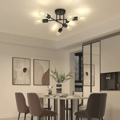 Modern chandelier in dining room with eight bulbs, above table and chairs, enhancing ambient lighting.