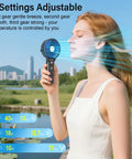 10400mAh Portable Handheld Fan With All Day Battery Life cooling a woman outdoors, showcasing adjustable 3-speed settings.