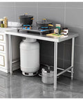 Badass Heavy Duty Stainless Steel Work Table With Open Storage Rack And Adjustable Legs Hella Durable Commercial Prep Counter with pots and gas cylinder.