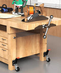 Workbench with Heavy Duty Retractable Workbench Casters Kit 720 Lb Capacity Side Mounted Wheels and pedal lift.