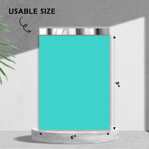Teal Poly Mailers 6 By 9 Inches Self Seal Waterproof Shipping Envelopes Bulk Pack Of 200 shown upright on display