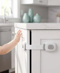 Baby hand near cabinet with 10 Pack Child Safety Cabinet Locks Easy Install Plastic Latches For Cabinets Drawers Fridge Oven Kitchen