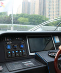 Five Gang Aluminum Marine Switch Panel with Three USB Ports and Blue LED Voltmeter on boat dashboard