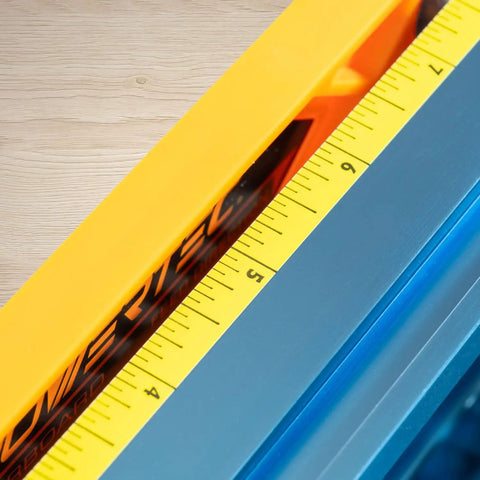 Close-up of Pro Grade Deluxe Router Table Fence Kit scale, showing measurement marks on the yellow ruler. 24x3-3/8 inches.