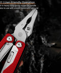 Close-up of 15-In-1 Spring Loaded Multitool Pliers with thickened hardened steel, red handles, and needle nose pliers.