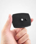 Hand holding Non Slip Camera Quick Release Plate 43mm For Tripods And Cameras No Hassle Quick Attach Secure Mount Lightweight Plastic