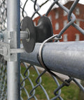 2 Pcs Chain Link Nylon Rolling Gate Track Wheel Rollers For Sliding Gates Compatible With 2 Inch Gate Frames And One And Five Eighths Inch Track Pipe With Galvanized Steel Cantilever Hardware installed on a fence