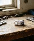 Dead Quiet Curtain Pulley Rollers With Hidden Rail Track And Dual Wheel Design For Heavy Drapes and Zero Hassle Ceiling Mount Hardware on workbench.