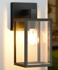 Built Tough Black Outdoor Wall Lantern With Waterproof Exterior Sconce Crafted For Next Level Curb Appeal Featuring E26 Socket Weather Ready All Season Lighting Built To Handle Heavy Rain, showing illuminated bulb.