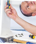 Person assembling furniture using 30 Sets Furniture Cam Connector Bolts Kit M6 With Cam Locks For Cabinets Drawers And Wardrobes
