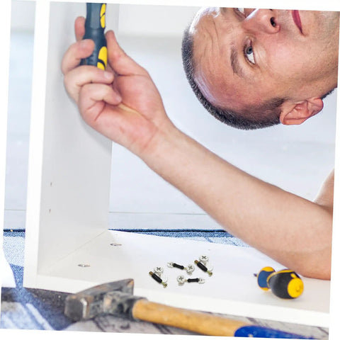 Person assembling furniture using 30 Sets Furniture Cam Connector Bolts Kit M6 With Cam Locks For Cabinets Drawers And Wardrobes