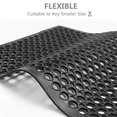 Heavy Duty Rubber Floor Mat With Drainage Holes 24 By 36 Inches Anti Fatigue Non Slip Indoor Outdoor Drain Mat shown curved