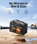Rock Hard 12 Volt 100 Amp Hour Lithium Iron Phosphate Battery For Marine And Trolling Motors With Blazing Fast Smartphone App Monitoring Built Tough Deep Cycle Power Supply Twin Pack Duo on sandy shore with water.