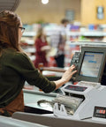 Pro Money Counter Machine With Value Count And Counterfeit Detection Using UV MG IR MT Tech LCD Display in use at checkout