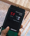 S4-P And Mini-Ligno SD/C Moisture Meter And Mold Detector Kit displaying 9.8% reading on wood surface