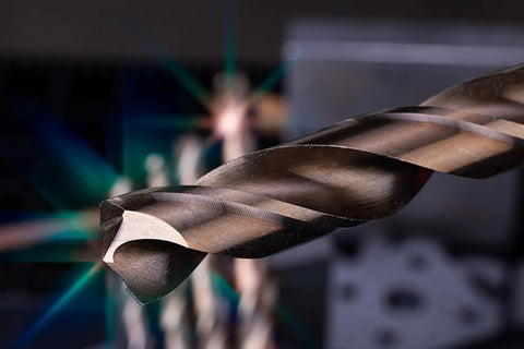 Close-up of a drill bit from Beefy 14 Piece M35 Cobalt Drill Bit Set For Stainless Steel And Hard Metals And Cast Iron, blurred background.